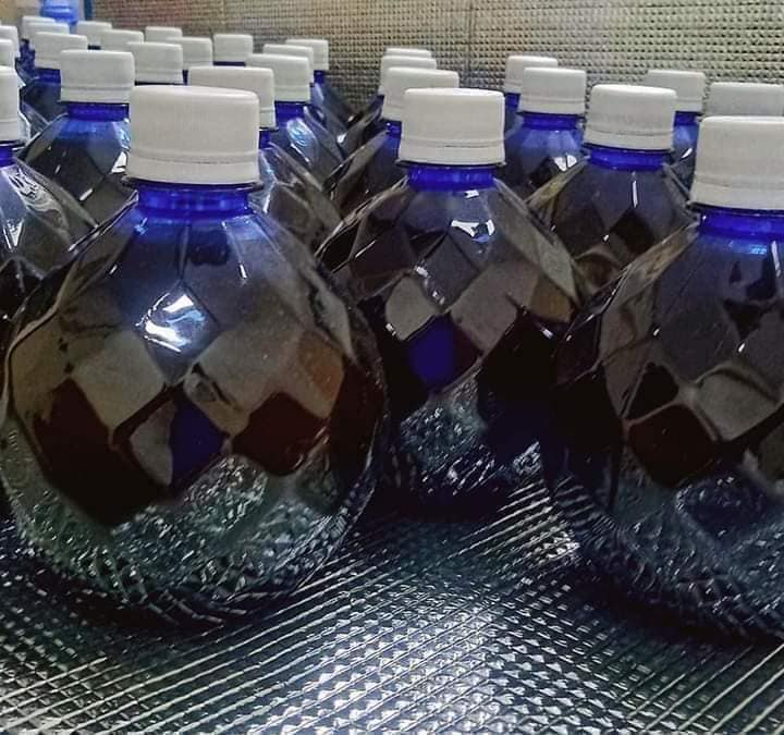 Picture of Organic Black Water for Pigeons and birds (1 liter)