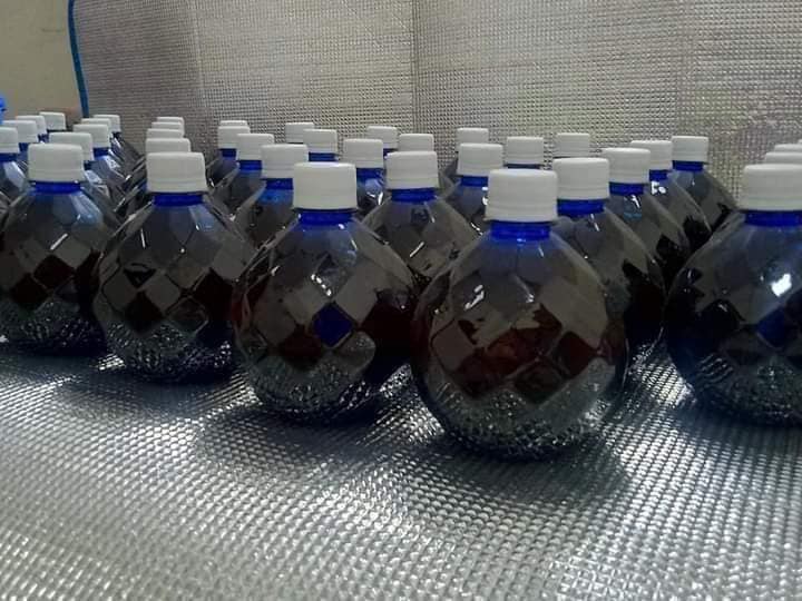 Picture of Organic Black Water for Pigeons and birds (1 liter)